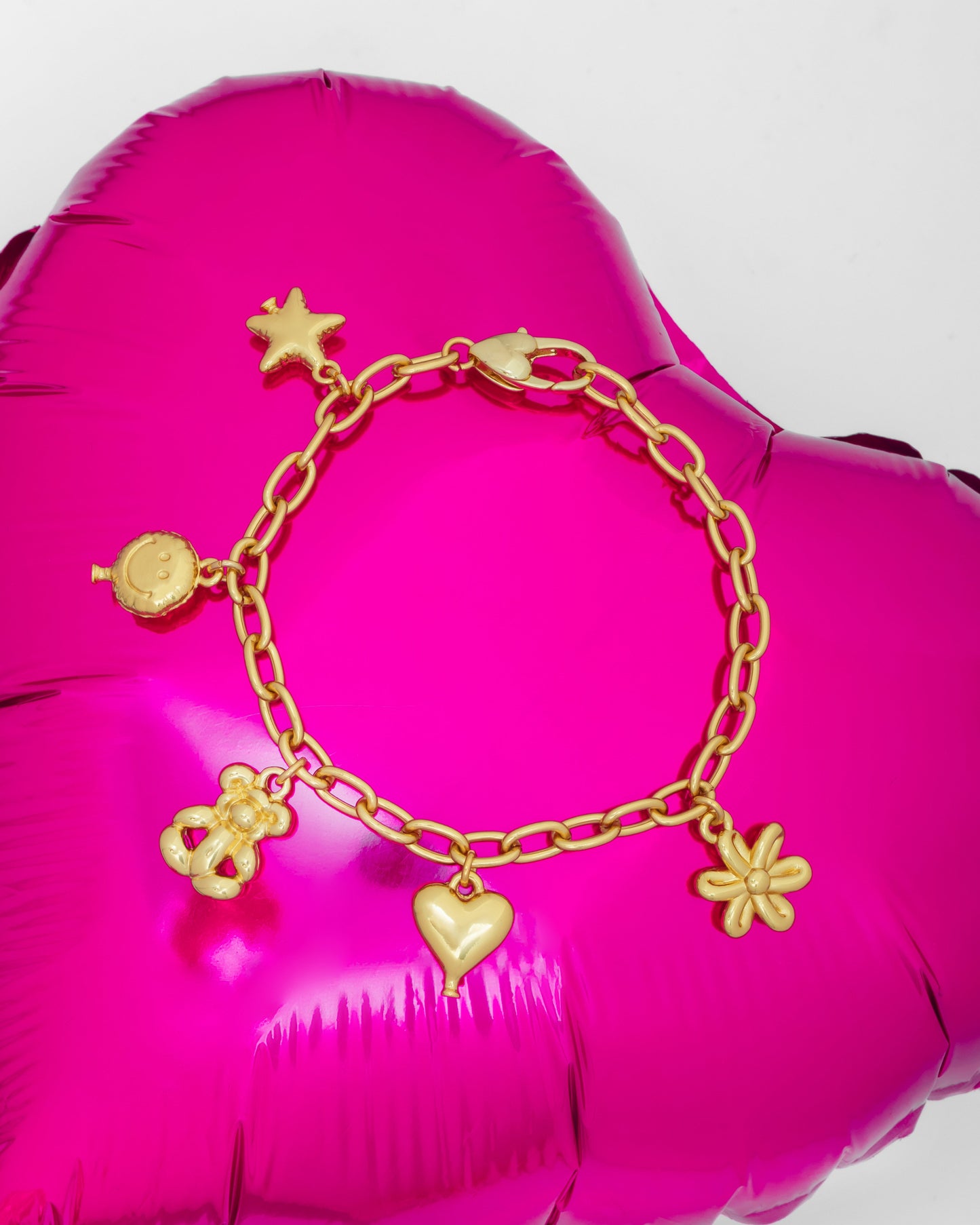 PULSERA MULTICHARMS FIGURAS GLOBO*