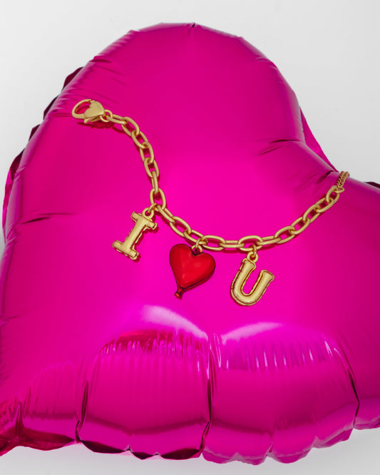 PULSERA MULTICHARMS LETRAS GLOBO*