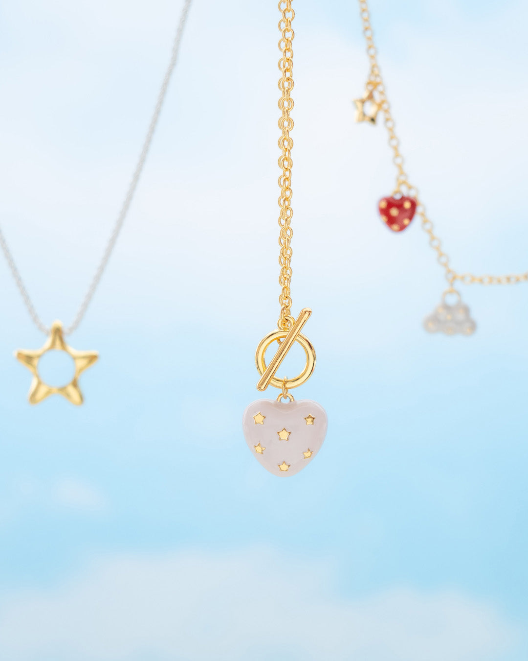 COLLAR BROCHE CORAZÓN ESTRELLA NUDE