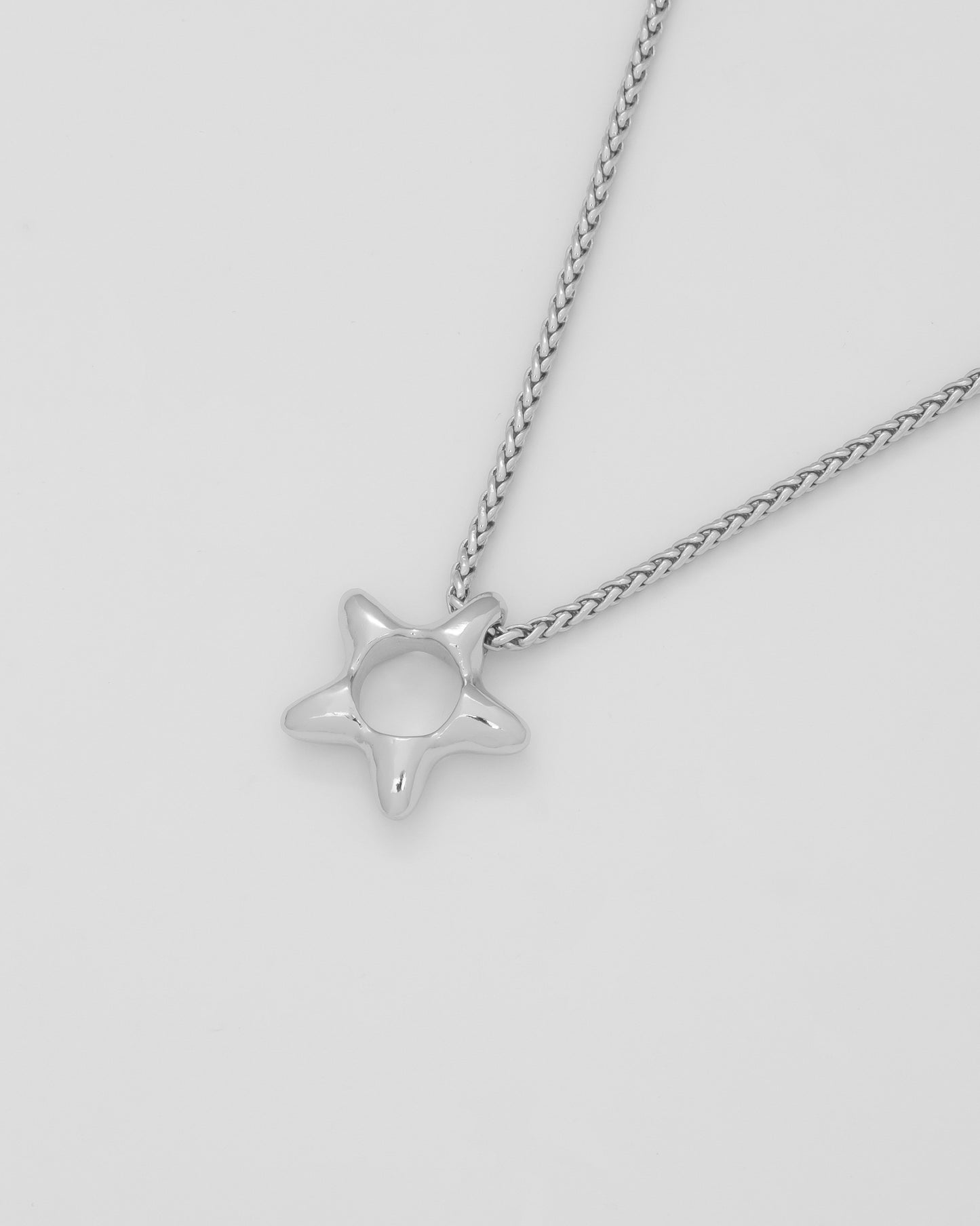 COLLAR ESTRELLA SILUETA MINI PLATA