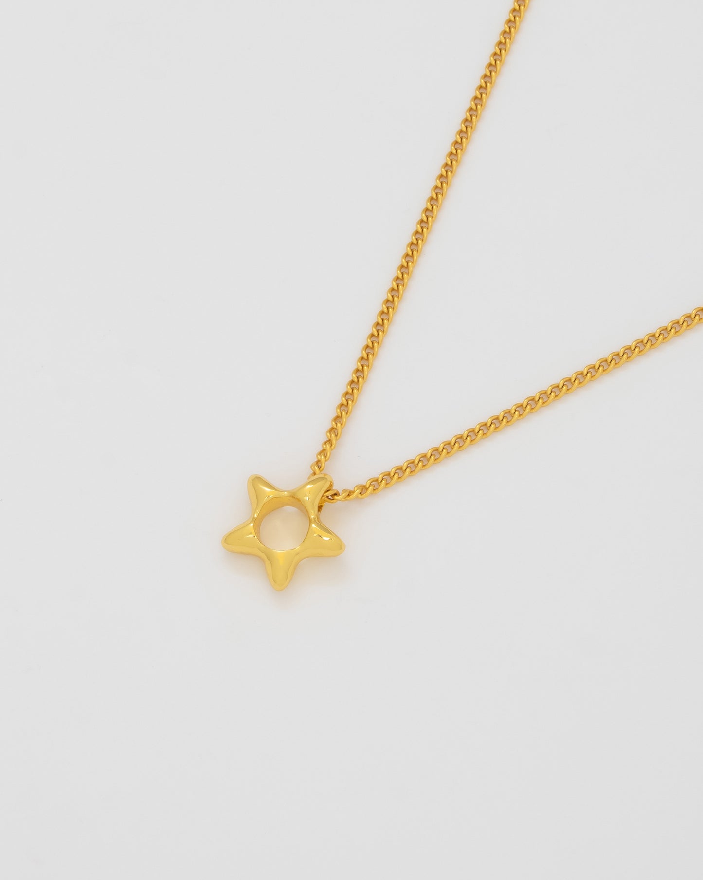 COLLAR ESTRELLA SILUETA MINI ORO