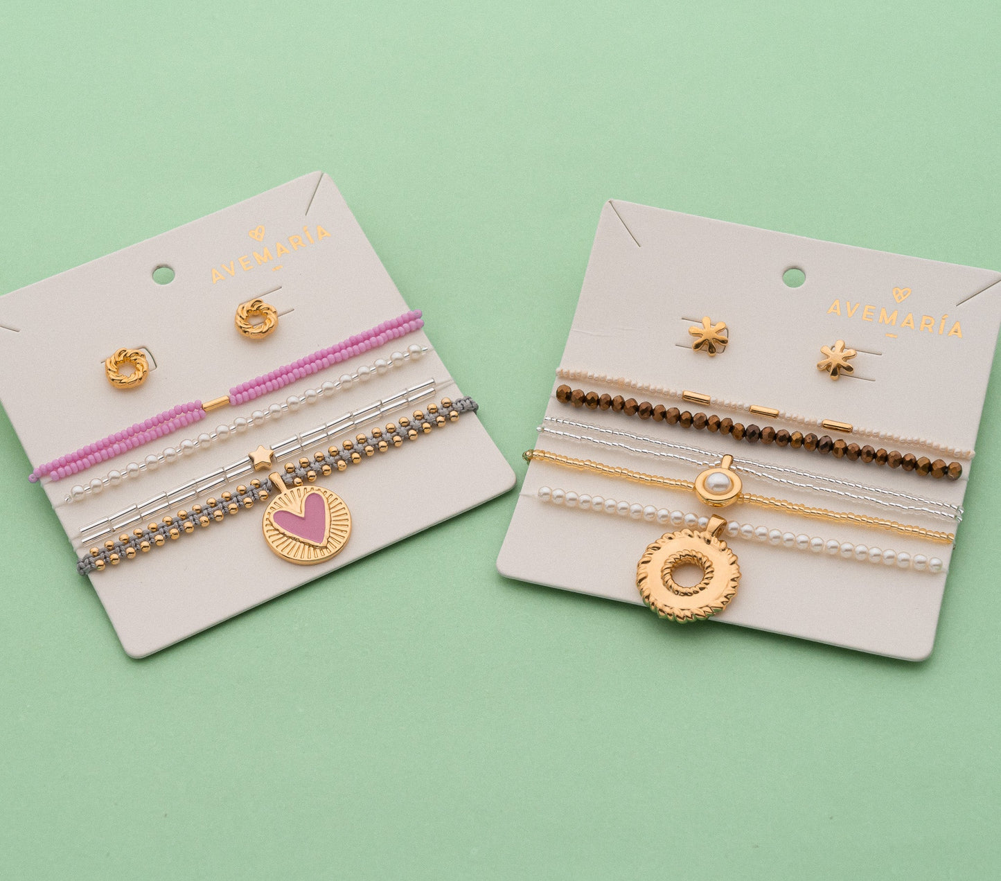 SET PULSERAS CON DIJE DE CORAZON FUCSIA + ARETES